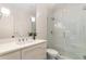 Bathroom featuring a glass shower, modern vanity, and tiled floors for a fresh and clean aesthetic at 123 Peachtree Cir, Atlanta, GA 30309