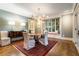 Bright dining room with an elegant chandelier, a large window seat, and well-lit space for Gathering and entertaining at 123 Peachtree Cir, Atlanta, GA 30309