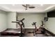 Home gym featuring a treadmill, stationary bike and ample floor space for workouts at 123 Peachtree Cir, Atlanta, GA 30309