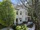 Beautiful two-story home with a charming front porch and manicured landscaping at 123 Peachtree Cir, Atlanta, GA 30309