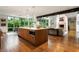 Open concept kitchen features a large island, stainless steel appliances, and view to an outdoor dining area at 123 Peachtree Cir, Atlanta, GA 30309