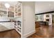 A butler's pantry features white cabinets and drawers with countertop space for food preparation and storage at 123 Peachtree Cir, Atlanta, GA 30309