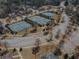 Aerial view of neighborhood tennis courts and recreation area at 15 Masters Dr, Villa Rica, GA 30180