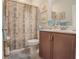 Bathroom features a decorative shower curtain and neutral decor at 15 Masters Dr, Villa Rica, GA 30180