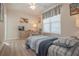 Comfortable bedroom with large window and relaxing color scheme at 15 Masters Dr, Villa Rica, GA 30180