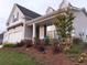 A charming single-story home with a welcoming front porch and well-maintained landscaping adding to its curb appeal at 15 Masters Dr, Villa Rica, GA 30180