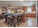 Open-concept kitchen and living area featuring hardwood floors and modern finishes, perfect for entertaining at 15 Masters Dr, Villa Rica, GA 30180
