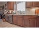 Well-lit kitchen featuring granite countertops, stainless steel appliances, and tile backsplash at 15 Masters Dr, Villa Rica, GA 30180