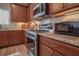 Updated kitchen with stainless steel appliances, granite countertops, and a gas range at 15 Masters Dr, Villa Rica, GA 30180