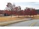Community park with mature trees in beautiful fall colors at 15 Masters Dr, Villa Rica, GA 30180