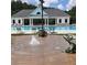A community pool with a tanning ledge and splash fountain at 15 Masters Dr, Villa Rica, GA 30180