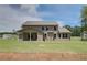 Expansive backyard showcasing a well-maintained lawn and the home's back exterior at 21 Homesite Cooper E Cv, Fayetteville, GA 30215