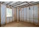 Unfinished basement with wood framing at 2191 Camp Ground Rd, Atlanta, GA 30331