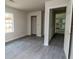 Room with newly installed floors, doors and windows, ready for finishing at 2191 Camp Ground Rd, Atlanta, GA 30331