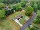 Aerial view of property highlighting lot size, landscaping, and convenient access to neighborhood streets at 2310 Rubart Dr, Marietta, GA 30066