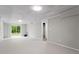 Large unfinished basement area with walkout access to yard, ready for customization and storage at 2310 Rubart Dr, Marietta, GA 30066