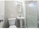 Updated bathroom featuring toilet, sink, and walk in shower at 2310 Rubart Dr, Marietta, GA 30066