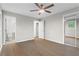 Bedroom featuring hardwood floors, ceiling fan and view to bathroom at 2310 Rubart Dr, Marietta, GA 30066