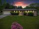 Charming brick home featuring a well-manicured lawn and a two-car garage at 2310 Rubart Dr, Marietta, GA 30066