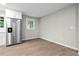 Modern eat-in kitchen featuring a stainless steel refrigerator and hardwood floors at 2310 Rubart Dr, Marietta, GA 30066