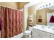 Well-lit bathroom with white cabinets, a matching shower curtain, and modern fixtures at 3344 Timbersedge Dr # 5, Marietta, GA 30064
