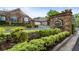 Inviting entrance to the Timbers Edge community with lush landscaping and stone signage at 3344 Timbersedge Dr # 5, Marietta, GA 30064