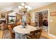 Bright dining room with chandelier and views into the living room, great for entertaining at 3344 Timbersedge Dr # 5, Marietta, GA 30064