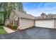 Lovely home with a two-car garage, stone accents, and a well manicured lawn at 3344 Timbersedge Dr # 5, Marietta, GA 30064
