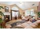 Bright living room with a fireplace, hardwood flooring, and comfortable seating at 3344 Timbersedge Dr # 5, Marietta, GA 30064