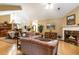 Spacious living room with fireplace, hardwood floors, and open layout to the dining area at 3344 Timbersedge Dr # 5, Marietta, GA 30064