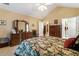 Spacious primary bedroom featuring vaulted ceilings and dark wood furnishings at 3344 Timbersedge Dr # 5, Marietta, GA 30064