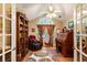 Home office featuring a vaulted ceiling, window with curtains, and built in shelving at 3344 Timbersedge Dr # 5, Marietta, GA 30064
