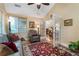 A cozy sitting room has natural light and an inviting armchair, perfect for relaxing with a book at 3344 Timbersedge Dr # 5, Marietta, GA 30064