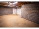 Spacious unfinished basement space with concrete floors and unfinished walls at 670 Maplelake Dr, Acworth, GA 30101