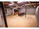 Large unfinished basement with concrete floors, exposed ceilings, and cinder block walls at 670 Maplelake Dr, Acworth, GA 30101