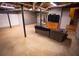 Unfinished basement space with concrete floors and exposed ducts and beams at 670 Maplelake Dr, Acworth, GA 30101
