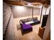 Unfinished basement featuring brick walls, exposed ceiling, and a seating area at 670 Maplelake Dr, Acworth, GA 30101