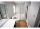 Well-lit bathroom features a soaking tub, separate shower, and modern vanity with ample counter space at 670 Maplelake Dr, Acworth, GA 30101