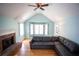 Bright living room features a fireplace, bay window, and vaulted ceiling at 670 Maplelake Dr, Acworth, GA 30101