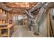 Spacious basement area with concrete floor, utilities, and exposed ceiling, great for storage or workshop at 1043 Middlebrooke Dr, Canton, GA 30115