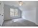 Bedroom with a large window, a ceiling fan, closet, and neutral carpet at 1043 Middlebrooke Dr, Canton, GA 30115