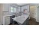 Well-lit kitchen with stainless steel dishwasher and a kitchen island at 1043 Middlebrooke Dr, Canton, GA 30115