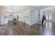 Spacious living room featuring hardwood floors, staircase, and open floor plan at 1043 Middlebrooke Dr, Canton, GA 30115