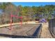 Community playground featuring swings and a slide, perfect for Gathering fun and outdoor activities at 1043 Middlebrooke Dr, Canton, GA 30115