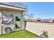 Rooftop deck with artificial grass, lighting and privacy fence at 151 Flat Shoals Ave # 13, Atlanta, GA 30316