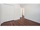 Bedroom with hardwood floors and closet at 1916 Oakwood Grove Dr, Snellville, GA 30078