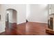Bright and airy living room featuring high ceilings, a fireplace, and elegant architectural details at 1916 Oakwood Grove Dr, Snellville, GA 30078
