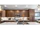 Modern kitchen with stainless steel appliances, granite countertops, and beautiful wooden cabinetry at 383 Pratt Se Dr # 504, Atlanta, GA 30315