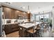 Gourmet kitchen with a large island, pendant lighting, stainless appliances and connected breakfast nook at 383 Pratt Se Dr # 504, Atlanta, GA 30315