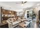 Bright and airy living room flowing into a modern kitchen with ample seating and access to a private balcony at 383 Pratt Se Dr # 504, Atlanta, GA 30315
